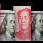 Uang kertas yuan China dan dolar AS terlihat dalam gambar ilustrasi ini yang diambil 29 September 2022. ANTARA/REUTERS/Florence Lo/pri.-1671420237