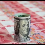 Ilustrasi - Dolar AS di Tumpukan yuan China. ANTARA/Shutterstock/pri.-1680503476